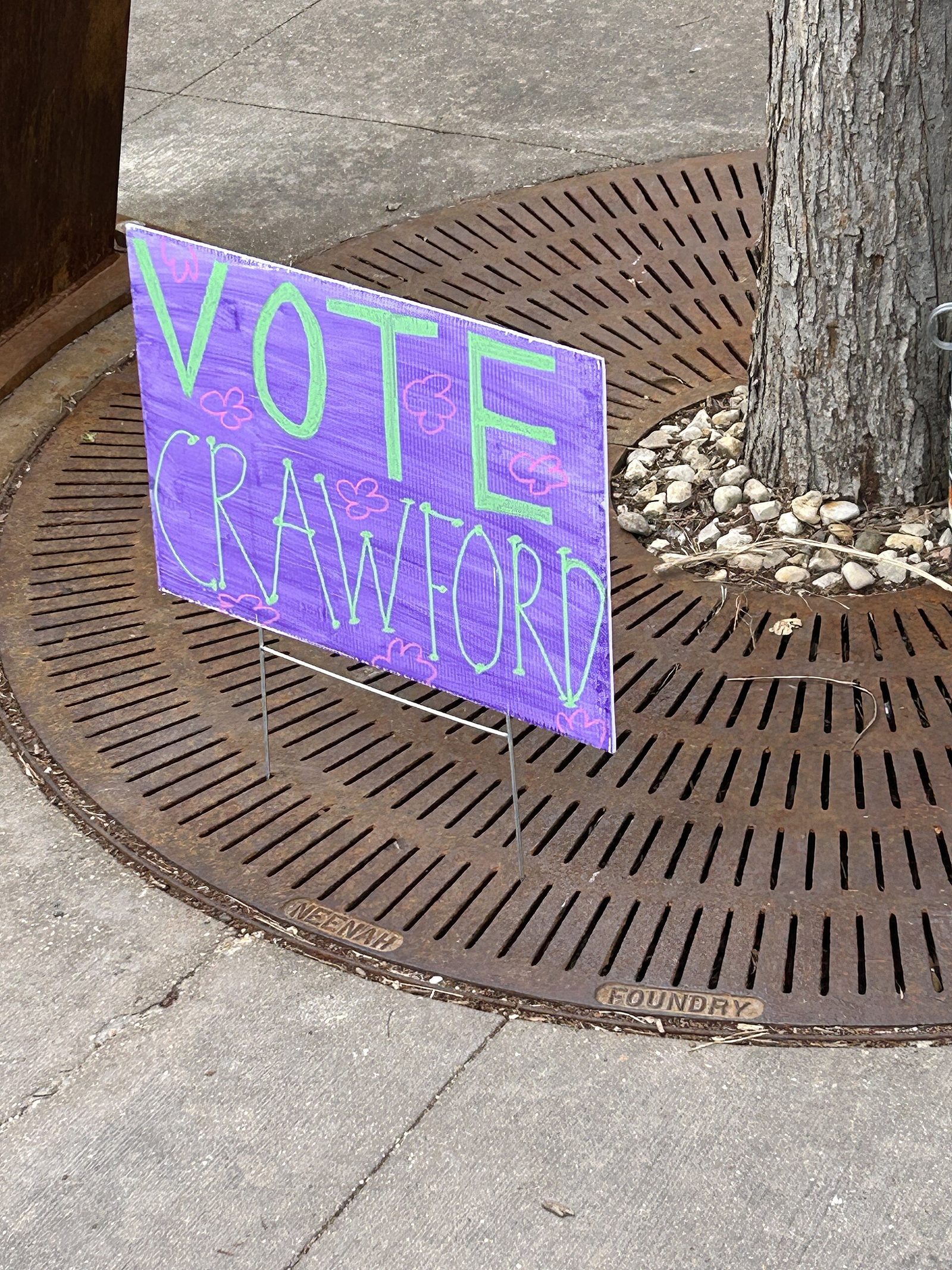 A Democratic field organizer knocks doors in a Texas neighborhood.