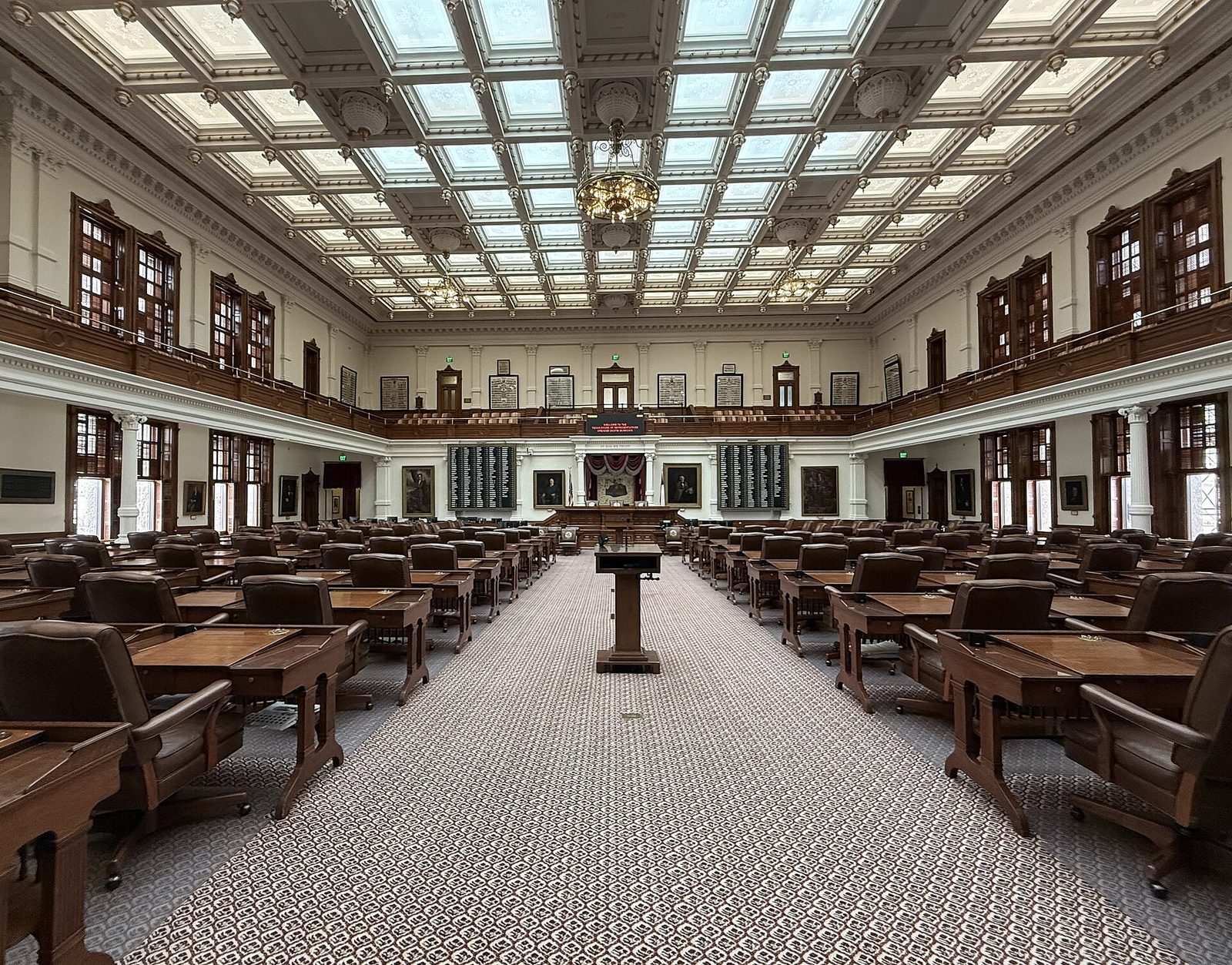 An empty Texas legislative chamber during the interim between sessions.
